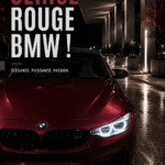 BMW rouge cerise garée dans un cadre urbain, stylée et moderne.
